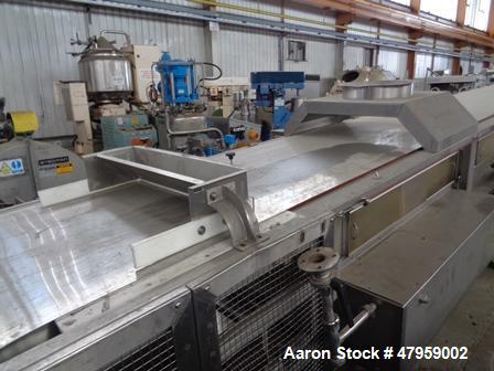Used Sandvik 1000mm Wide x 10,000mm Long Stainless Steel Inclined Belt Cooler. Approximately 1950kg/hr throughput capacity. Belt is driven by a 0.30/3 kw, 144/1440 rpm, 415 volt motor through a renol...