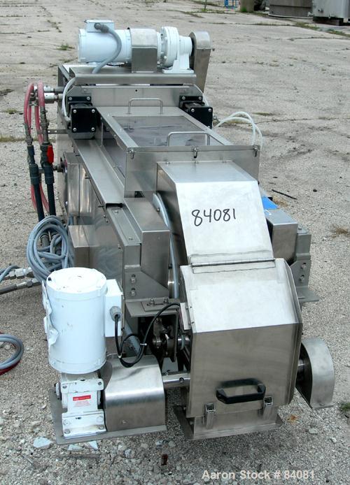 Used Sandvik Belt Cooler, 316 Stainless Steel. 12" Wide x 63" long belt, on 24" diameter cored rolls, driven by a 1/2 HP, 3/60/208-230/460 Volt, 1725 RPM gearmotor, ratio 165:1. (2) Pneumatically adj...