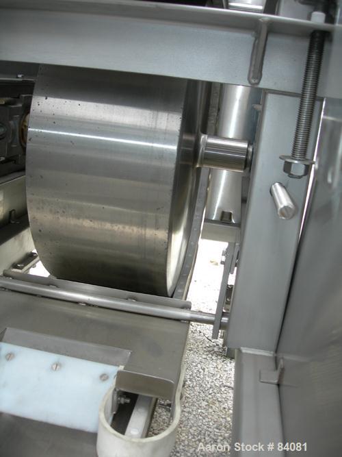 Used Sandvik Belt Cooler, 316 Stainless Steel. 12" Wide x 63" long belt, on 24" diameter cored rolls, driven by a 1/2 HP, 3/60/208-230/460 Volt, 1725 RPM gearmotor, ratio 165:1. (2) Pneumatically adj...