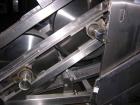USED: Berndorf Belt Systems (BBS) inclined belt flaker. All sanitary stainless steel construction including drums, belts, frame and enclosure, continuously cooled belt surfaces, cooling medium in dru...