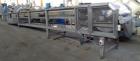 Used Sandvik 1000mm Wide x 10,000mm Long Stainless Steel Inclined Belt Cooler. Approximately 1950kg/hr throughput capacity. Belt is driven by a 0.30/3 kw, 144/1440 rpm, 415 volt motor through a renol...