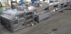 Used Sandvik 1000mm Wide x 10,000mm Long Stainless Steel Inclined Belt Cooler. Approximately 1950kg/hr throughput capacity. Belt is driven by a 0.30/3 kw, 144/1440 rpm, 415 volt motor through a renol...