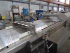 Used Sandvik 1000mm Wide x 10,000mm Long Stainless Steel Inclined Belt Cooler. Approximately 1950kg/hr throughput capacity. Belt is driven by a 0.30/3 kw, 144/1440 rpm, 415 volt motor through a renol...
