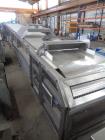 Used- Sandvik 1000mm Wide x 10,000mm Long Stainless Steel Inclined Belt Cooler. Approximately 1950kg/hr throughput capacity....