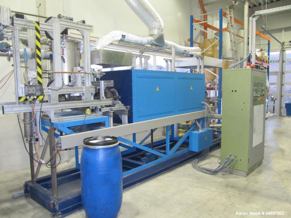 Used Continuously Operating High Temperature Calciner for evaporation of volatiles / reactive treatment of powder / pelletrized material.  Chemical Vapor Deposition (CVD).  The machine is based on a ...