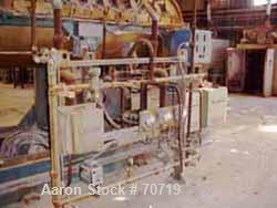 Used American Gas Furnace Rotary Calciner, Model 278 Heating Machine. 18" diameter x 14' long titanium T40 tube. Temp range 500 to 1500 Degrees F. 2 zone gas fired, approximately 600 cubic feet per h...