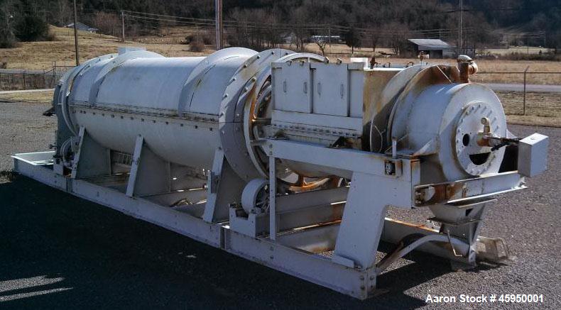 Used Bartlett Snow Indirect Fired Rotary Calciner. 304 stainless steel.  Skid mounted, no control panel. Heating area 15 6", cooling area 5 6". Tube with internal flights.  Tube is approx 24" inside ...