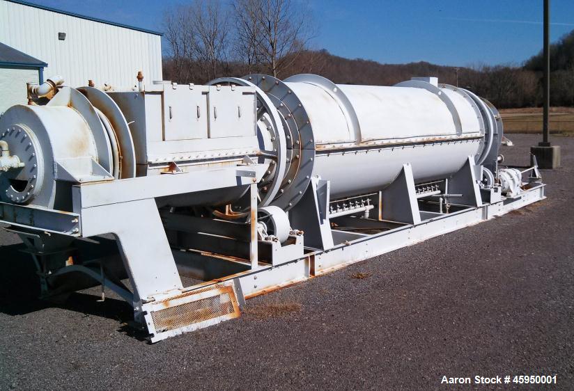 Used Bartlett Snow Indirect Fired Rotary Calciner. 304 stainless steel.  Skid mounted, no control panel. Heating area 15 6", cooling area 5 6". Tube with internal flights.  Tube is approx 24" inside ...