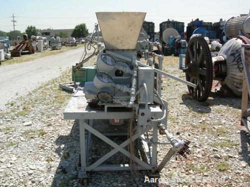 USED:Bartlett Snow rotary calciner. 6-1/2" diameter x 11' long.Refractory lined, tube is constructed of 12% nickel and 25% chrome.Gas fired up to 2200 deg F. 3 zone 80" heating section. 12"W x 18"L x...