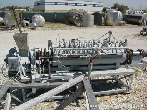 USED:Bartlett Snow rotary calciner. 6-1/2" diameter x 11' long.Refractory lined, tube is constructed of 12% nickel and 25% chrome.Gas fired up to 2200 deg F. 3 zone 80" heating section. 12"W x 18"L x...