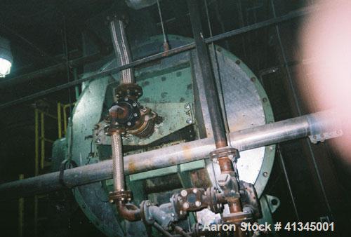 Used Stord Rotadisc Dryer, Model TST-70R. 2,658 square feet heating area, carbon steel, 52 discs, 9 rpm, manufactured 1990. 34'8" long x 7'2" wide x 10'6" high.