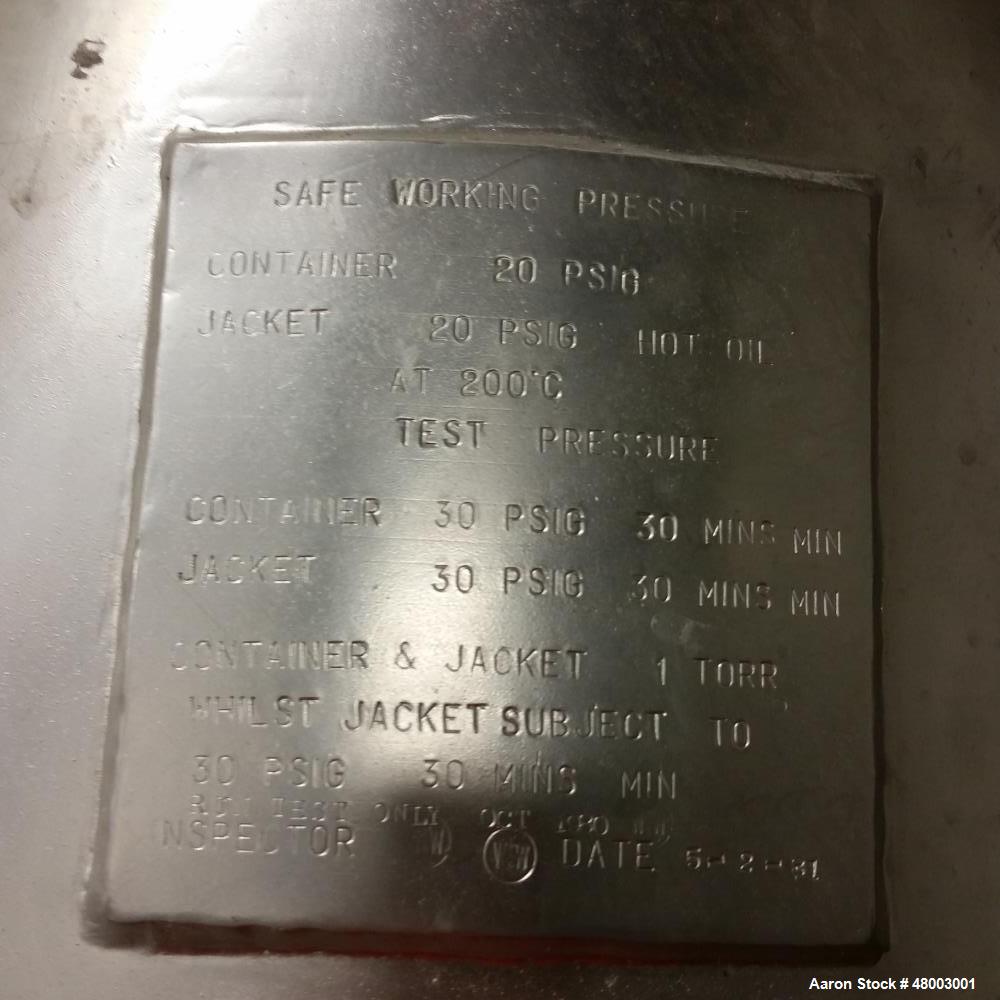 Used Baker Perkins Double Cone Dryer. 3 cubic foot capacity. Stainless steel. Internal rated 20 psig, jacket rated 20 psig at 200 deg C. Hot oil. Mfg. 1981.