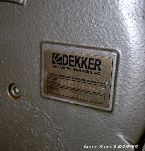 Used Patterson-Kelley Twin Shell Vacuum Tumble Dryer, 10 Cubic Feet, 316L Stainless Steel. Internal rated for full vacuum, 304 stainless steel jacket rated 30 psi at 250 degrees F. Maximum material d...