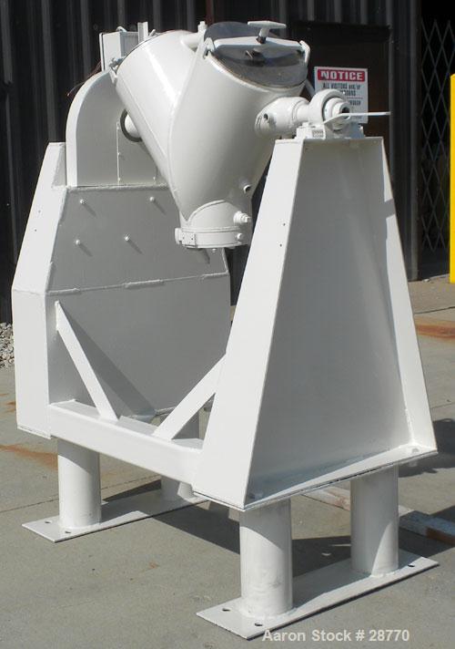 Used Patterson-Kelley 1 Cubic Foot Twin Shell Dry Blender, 304 Stainless Steel. (2) 11" Diameter top charge ports with quick release covers, approximately 16-1/2" deep. Carbon steel jacket rated 30 P...