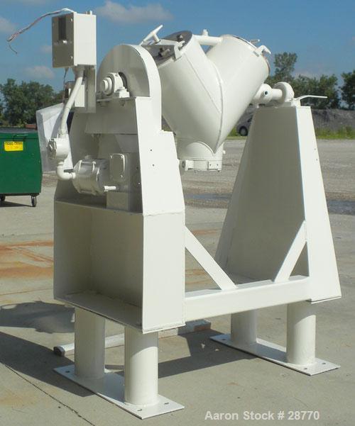 Used Patterson-Kelley 1 Cubic Foot Twin Shell Dry Blender, 304 Stainless Steel. (2) 11" Diameter top charge ports with quick release covers, approximately 16-1/2" deep. Carbon steel jacket rated 30 P...