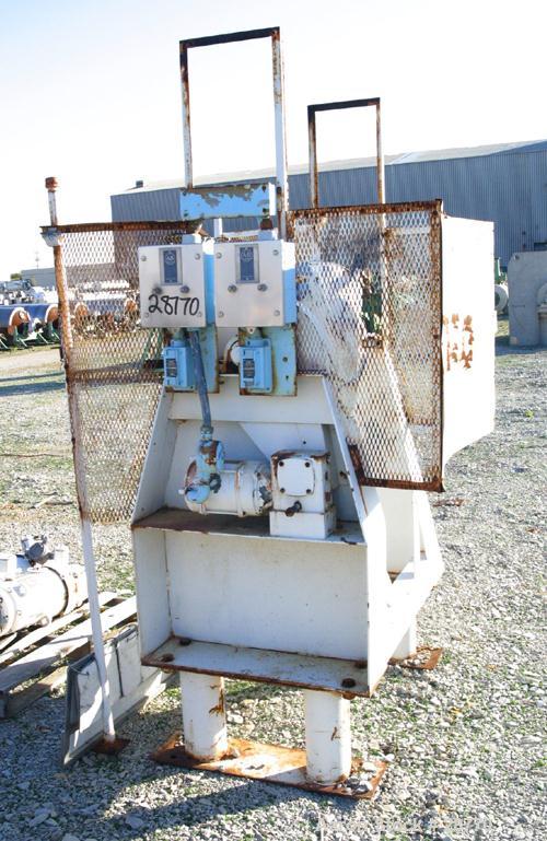 Used Patterson-Kelley 1 Cubic Foot Twin Shell Dry Blender, 304 Stainless Steel. (2) 11" Diameter top charge ports with quick release covers, approximately 16-1/2" deep. Carbon steel jacket rated 30 P...