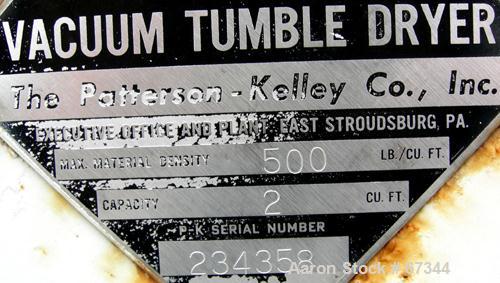 USED: Patterson Kelly twin shell vacuum tumble dryer, 2 cubic foot capacity, 304 stainless steel. Max material density 500 lb/cubic foot. Jacketed, rated 30 psi at 250 deg F. (2) 14" diameter top cha...