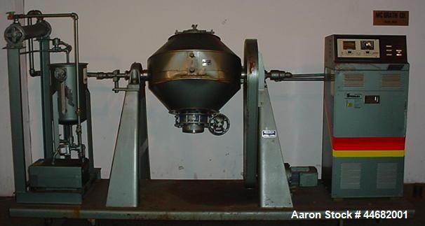Used Paul O. Abbe Rota-Cone Vacuum Dryer 24RCVD.  2.5 Cubic feet mixing capacity, 5 rpm, 3/4 hp drive.  304 Stainless steel, 12 kW Sterlco S8412AX electric heat transfer, water cooled condenser and t...