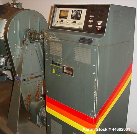 Used Paul O. Abbe Rota-Cone Vacuum Dryer 24RCVD.  2.5 Cubic feet mixing capacity, 5 rpm, 3/4 hp drive.  304 Stainless steel, 12 kW Sterlco S8412AX electric heat transfer, water cooled condenser and t...