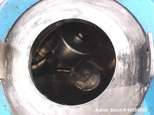 Used Paul O Abbe Double Cone Vacuum Dryer, Model 9RCVD, Stainless Steel. .14 cubic foot working capacity, .2 cubic foot total. Jacketed shell with a 3 1/2" charge port. Driven by a 1/3 hp, 3/60/208-2...