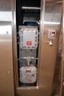Used Patterson-Kelley Twin Shell Vacuum Tumble Dryer, 10 Cubic Feet, 316L Stainless Steel. Internal rated for full vacuum, 304 stainless steel jacket rated 30 psi at 250 degrees F. Maximum material d...