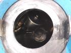 Used Paul O Abbe Double Cone Vacuum Dryer, Model 9RCVD, Stainless Steel. .14 cubic foot working capacity, .2 cubic foot total. Jacketed shell with a 3 1/2