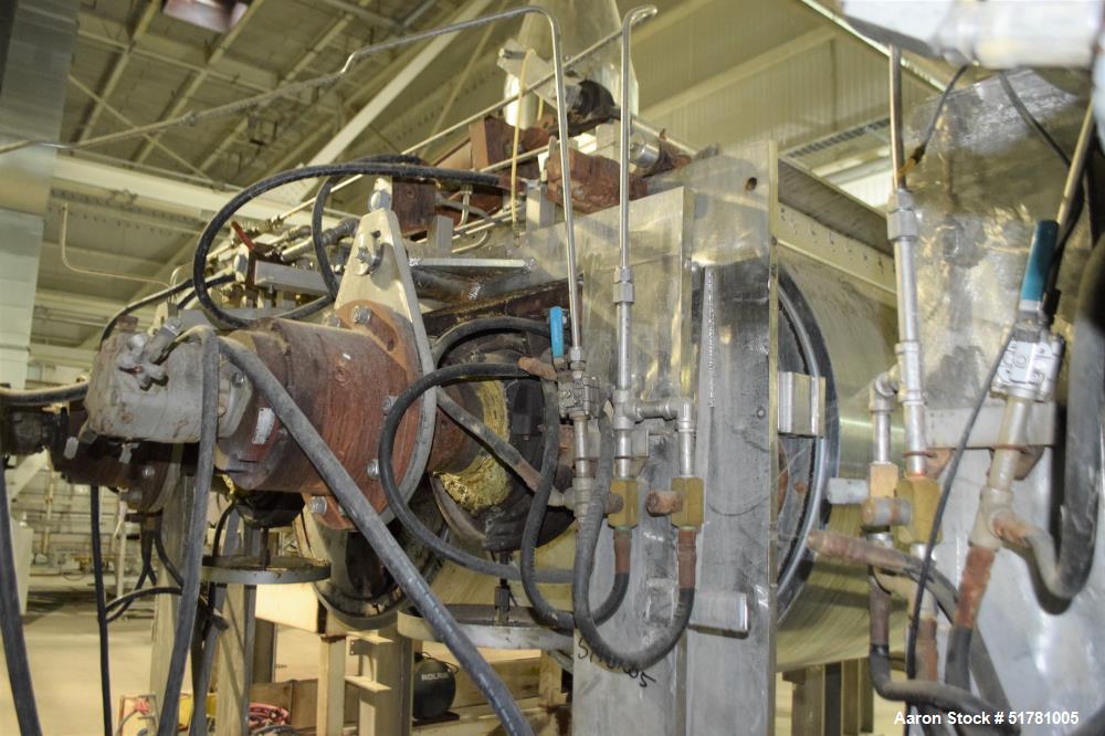 Used Double Drum Dryer. (2) Approximate 42" diameter x 120" face chrome plated rolls. Approximate rating 160 psi at 450 degrees F.. Each roll set up for a hydraulic drive. 15HP Hydraulic power pack. ...