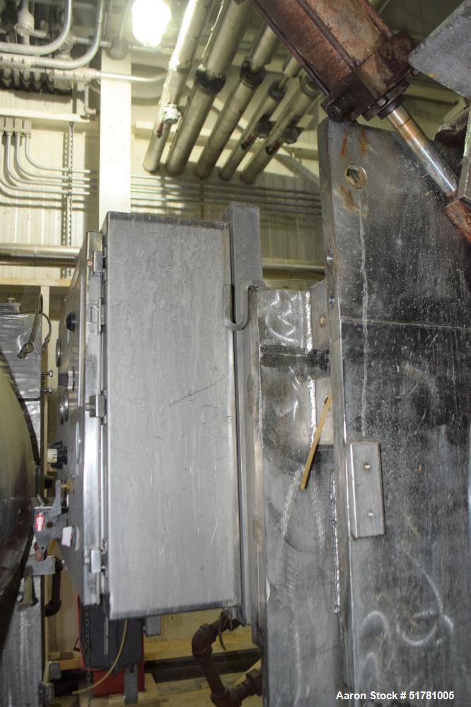 Used Double Drum Dryer. (2) Approximate 42" diameter x 120" face chrome plated rolls. Approximate rating 160 psi at 450 degrees F.. Each roll set up for a hydraulic drive. 15HP Hydraulic power pack. ...