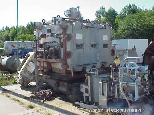 USED: Buffalo Tech double drum vacuum dryer. Has 24" x 60" cast iron drums rated 150 psi, full vacuum, 304 stainless steel shell, variable speed Reeves 5 hp motor (4.85 rpm to 48.5 rpm). OAD 14'L x 7...