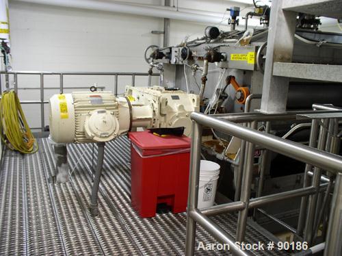 Used Buflovak Single Drum Flaker, 316 stainless steel. 60" diameter x 96" face cored drum that has 0.68" thick wall  rated 60 psi at 300 deg F. Driven by a 20/40 hp, 3/6-60/460 volt, 1790/1775 rpm mo...