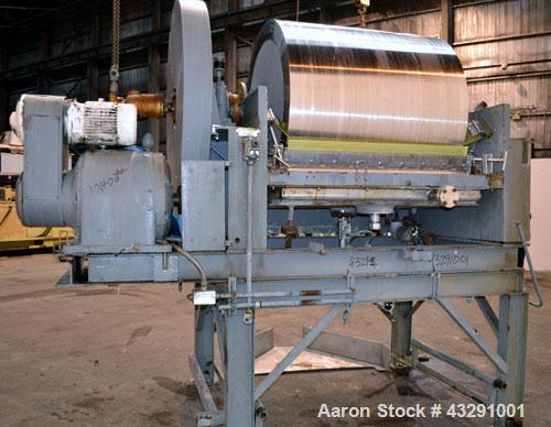Used Buflovak Single Drum Flaker, 304 Stainless Steel. 48" Diameter x 48" face cored drum, 50 square foot area, rated 80 psi at 325 degrees F. Includes (2) knife scrapers with a blades, end drum scra...