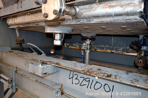 Used Buflovak Single Drum Flaker, 304 Stainless Steel. 48" Diameter x 48" face cored drum, 50 square foot area, rated 80 psi at 325 degrees F. Includes (2) knife scrapers with a blades, end drum scra...