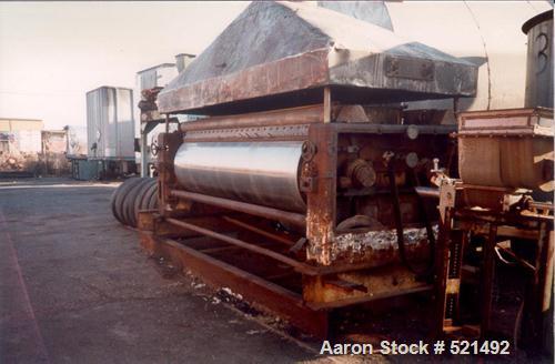USED: Buflovak double drum dryer, 42" x 120" drums, chrome plated. (1) Drum rated 160 psi, other drum rated 100 psi with stainless steel hood. Requires two side conveyors, stainless steel. Drip pan. ...