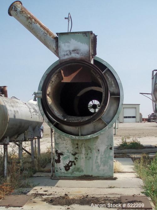 USED: Stern Roger rotary drum dryer system consisting of a Stern Roger10'6" diameter x 60' long single pass rotary drum dryer with a newPeabody 30,000,000 btu burner. Also included is a Heil dryer us...
