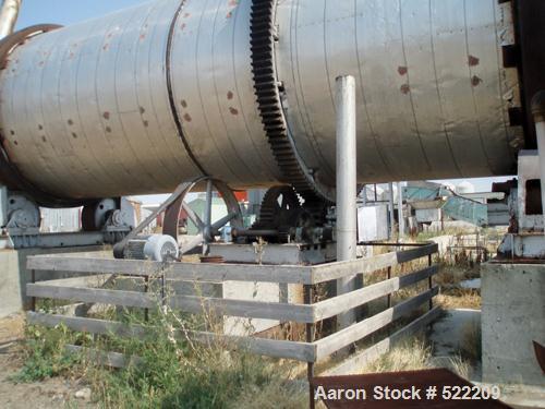 USED: Stern Roger rotary drum dryer system consisting of a Stern Roger10'6" diameter x 60' long single pass rotary drum dryer with a newPeabody 30,000,000 btu burner. Also included is a Heil dryer us...