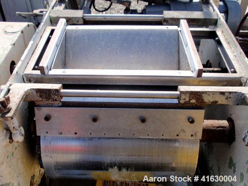 Used Stokes Double Drum Dryer, Model 214-0A. (2) 8-1/2" diameter x 11" face width cored drums with rotary unions, rated 100 psi. Knife discharge, dual edge guides. Driven by a 1.5 hp, 230/460 volt Re...