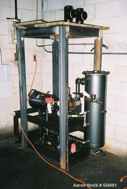 USED: Flash drying system designed to remove 1% to 2% water from industrial lubricating oils. Oil is pumped through a plate type heat exchanger where it enters the flash dryer chambers through a spra...