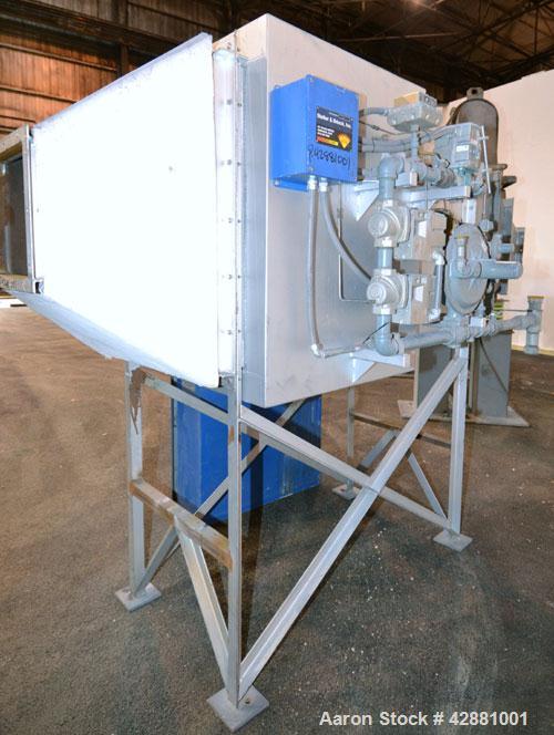 Used Carrier Vibrating Equipment Dryer/Cooler, Model FCAD-12100S, 304 Stainless Steel. 11’’ wide x 135’’ long trough, approximately 120’’ long section with a perforated “W” shaped deck. Top end feed,...