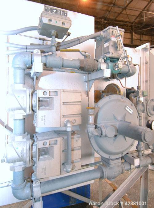 Used Carrier Vibrating Equipment Dryer/Cooler, Model FCAD-12100S, 304 Stainless Steel. 11’’ wide x 135’’ long trough, approximately 120’’ long section with a perforated “W” shaped deck. Top end feed,...