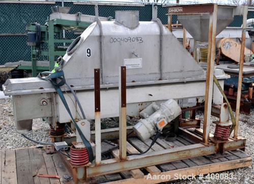 Used Carrier Vibratory Continuous Fluid Bed Dryer, Model FTAD1240S14GA, 304 stainless steel.  Approximately 10" wide x 90" long bottom perforated screen. Approximately 1 hp vibrating motor. Stroke 3/...