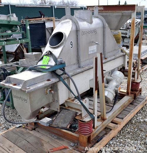 Used Carrier Vibratory Continuous Fluid Bed Dryer, Model FTAD1240S14GA, 304 stainless steel.  Approximately 10" wide x 90" long bottom perforated screen. Approximately 1 hp vibrating motor. Stroke 3/...