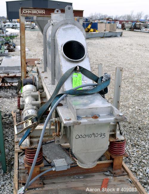 Used Carrier Vibratory Continuous Fluid Bed Dryer, Model FTAD1240S14GA, 304 stainless steel.  Approximately 10" wide x 90" long bottom perforated screen. Approximately 1 hp vibrating motor. Stroke 3/...
