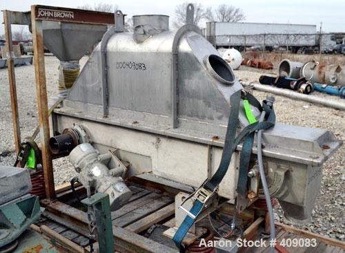 Used Carrier Vibratory Continuous Fluid Bed Dryer, Model FTAD1240S14GA, 304 stainless steel.  Approximately 10" wide x 90" long bottom perforated screen. Approximately 1 hp vibrating motor. Stroke 3/...