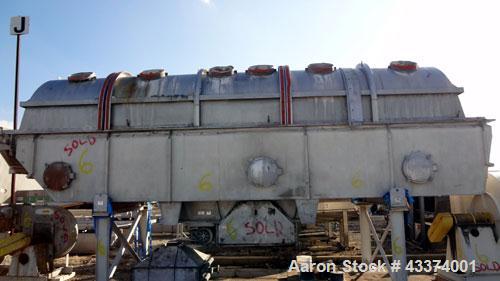 Used Carrier Vibrating Equipment Fluid-Flow Vibrating Fluid Bed Dryer / Cooler, Model QAD/C-7260. 304 Stainless Steel. Overall size 84" wide x 30'6" long x 144" tall. 25hp motor, 40hp blower, with he...