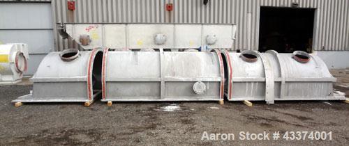 Used Carrier Vibrating Equipment Fluid-Flow Vibrating Fluid Bed Dryer / Cooler, Model QAD/C-7260. 304 Stainless Steel. Overall size 84" wide x 30'6" long x 144" tall. 25hp motor, 40hp blower, with he...