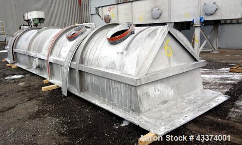 Used Carrier Vibrating Equipment Fluid-Flow Vibrating Fluid Bed Dryer / Cooler, Model QAD/C-7260. 304 Stainless Steel. Overall size 84" wide x 30'6" long x 144" tall. 25hp motor, 40hp blower, with he...