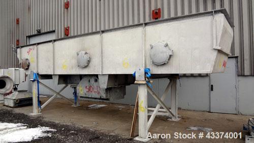 Used Carrier Vibrating Equipment Fluid-Flow Vibrating Fluid Bed Dryer / Cooler, Model QAD/C-7260. 304 Stainless Steel. Overall size 84" wide x 30'6" long x 144" tall. 25hp motor, 40hp blower, with he...