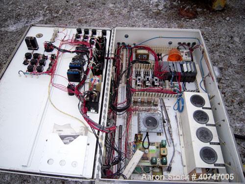 Used Carrier Vibrating Equipment Vibratory Continuous Fluid Bed Dryer/Cooler, model QAD/C3-2460S, 304 stainless steel. Approximate 23" wide x 222" long bottom screen.  Stroke 3/16". Top end inlet, en...