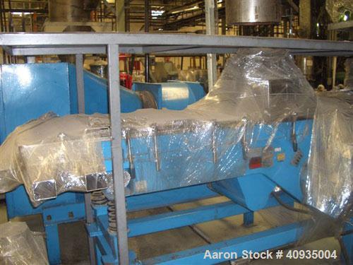 Used Fluid bed dryer. Stainless steel construction. 3 deck seperation. Approximately 30" x 7' long. Unit includes heating element and blower assembly.