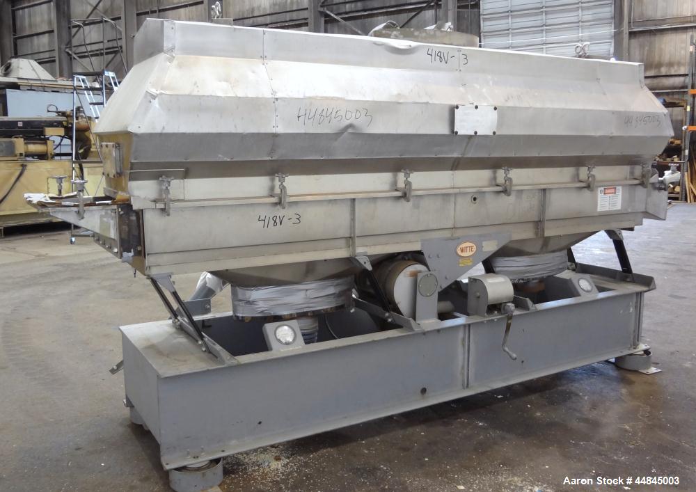 Used Witte Vibrating Fluid Bed Dryer, 304 Stainless Steel, 144" long x 24" wide bed with slotted screen. Clamp on top cover with (1) 30" x 16" oval top air outlet, (2) 9" bottom air inlets. Design ra...
